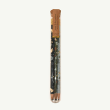 Load image into Gallery viewer, A set of 5 pencils in a glass propogation tube that is sealed with a cork. Each pencil is already sharpened and has deep, rich-colored garden designs along the barrel.

